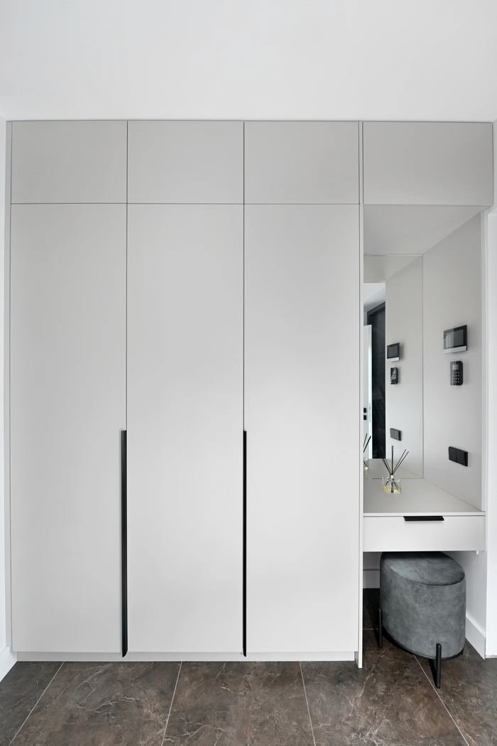 Floor-to-ceiling fitted wardrobe